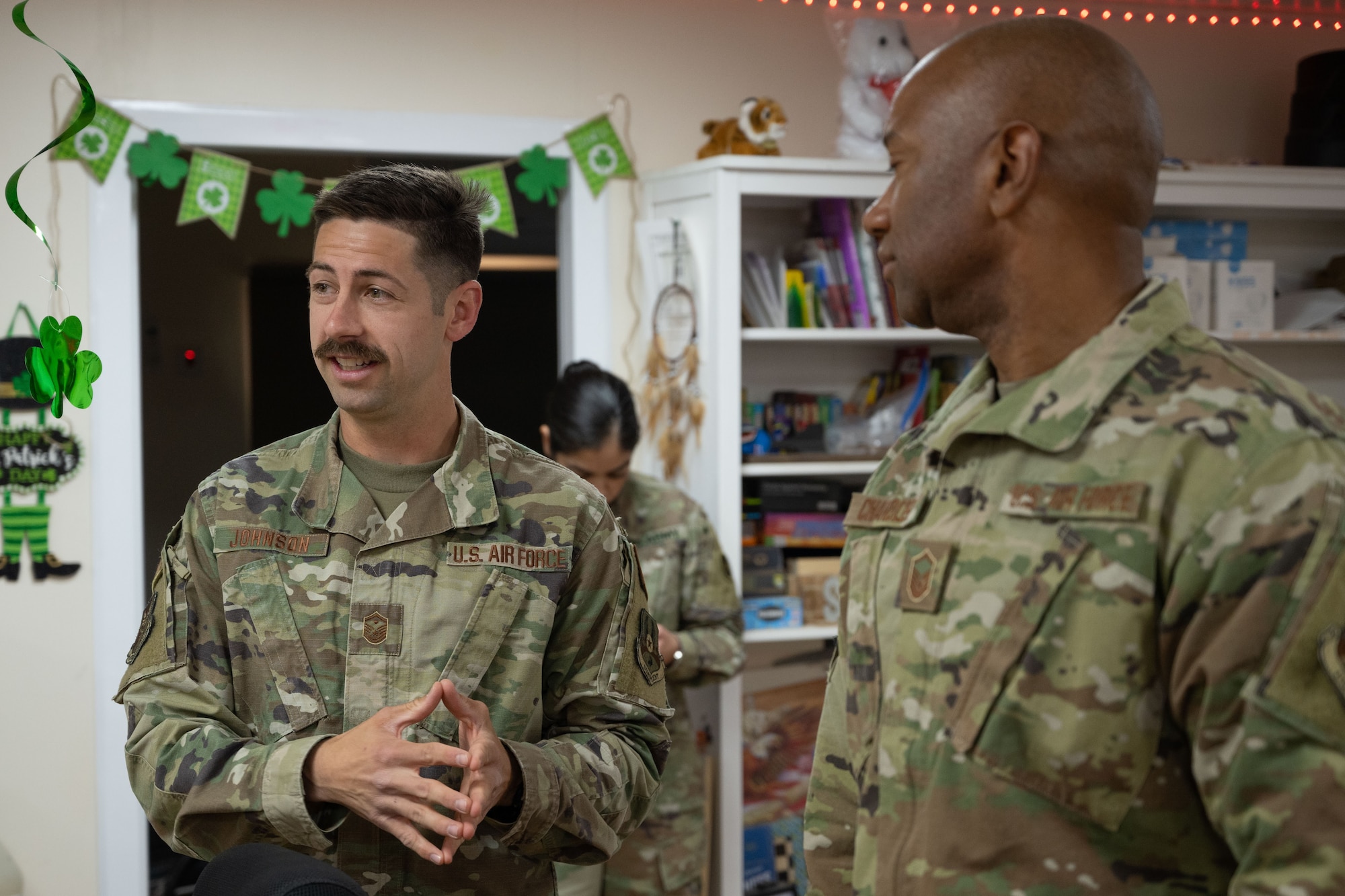 U.S. Air Force Master Sgt. Joshua Johnson (left), 1st Sgt., 120th Expeditionary Fighter Generation Squadron, mentors U.S. Air Force Master Sgt. Malcom Chandler, 120th Expeditionary Fighter Squadron, Additional Duty 1st Sgt, at Prince Sultan Air Base, Kingdom of Saudi Arabia, March 18th, 2022. Johnson coached and mentored four Additional Duty 1st Sgts within two units. (Photo by U.S. Air Force 1st Lt. Benjamin Kimball)