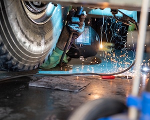 Tech. Sgt. Richard Collins, Pennsylvania Air National Guard vehicle maintenance craftsman, performs maintenance