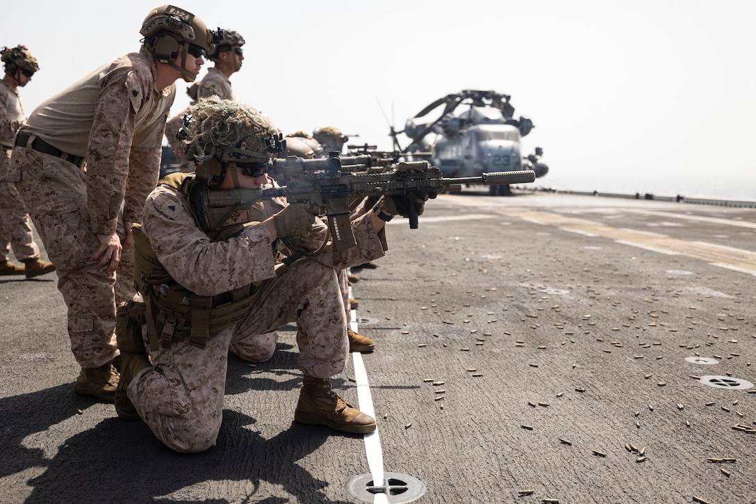 230811-M-VB101-3033 GULF OF ADEN (Aug. 11, 2023) U.S. Marines conduct weapons training aboard amphibious assault ship USS Bataan (LHD 5) in the Gulf of Aden, Aug. 11, 2023. Components of the Bataan Amphibious Ready Group and 26th Marine Expeditionary Unit are deployed to the U.S. 5th Fleet area of operations to help ensure maritime security and stability in the Middle East region. (U.S. Marine Corps photo by Sgt. Matthew Romonoyske-Bean)