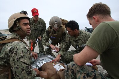 Expeditionary Medical Facility Kilo successfully completed its Operational Readiness Evaluation June 14-21 in Camp Pendleton, California. Approximately 134 EMF Kilo personnel trained in setting up and operating a 50-bed, medical treatment facility. The exercise resulted in formal certification the team is deployment-ready. EMF Kilo is subordinate command of Navy Medicine Readiness and Training Command Camp Lejeune in North Carolina. (Photo by HM2 James Comick, Naval Expeditionary Medical Training Institute)