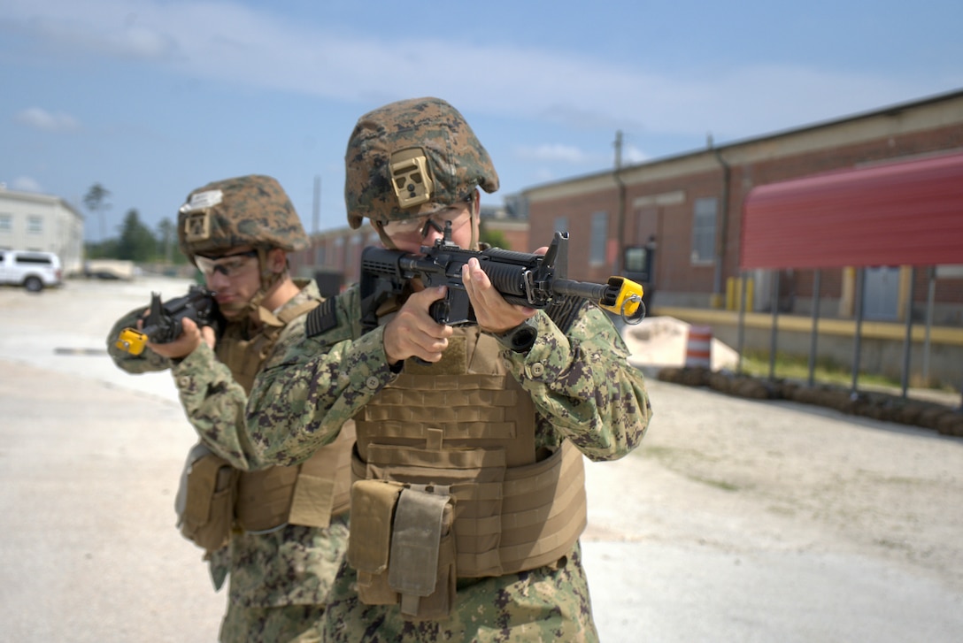 U.S. Naval Academy midshipmen conduct close quarters combat on Camp Camp Lejeune, North Carolina, June 15th, 2023. Professional Training of Midshipmen
 is an eight week course that is designed to expose 3rd class shipmen to a variety of career options, including career paths as junior Marine Corps Officers in order to generate interest in pursuing a Marine Corps officer commission.
