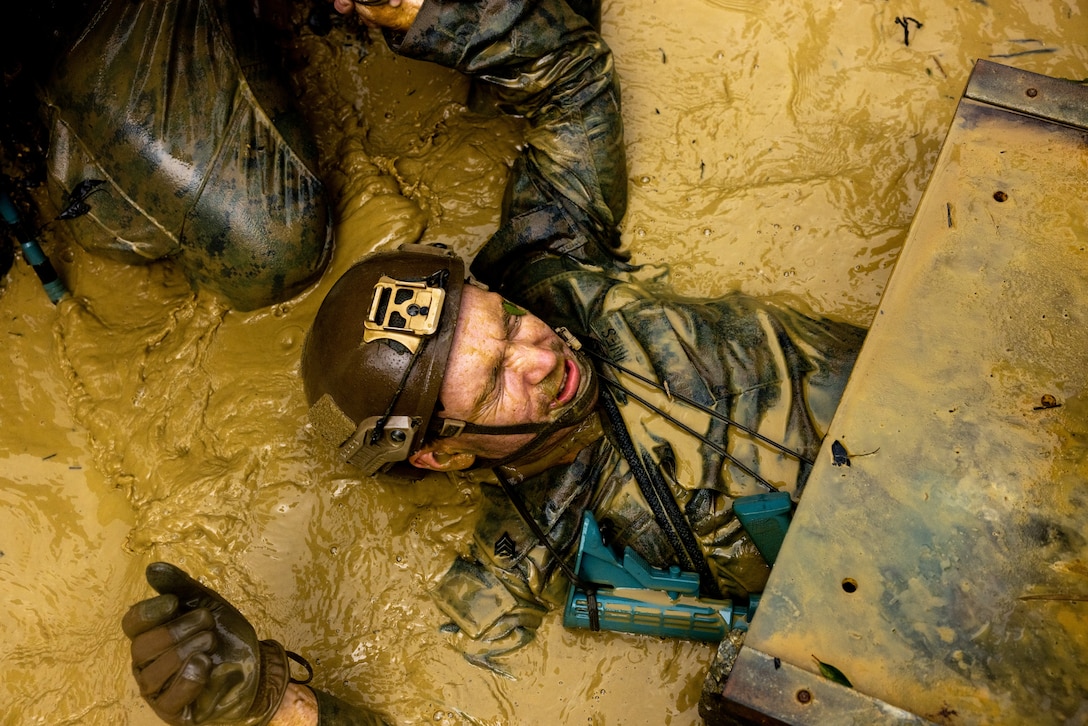 U.S. Marine Corps Sgt. Zachary Thacker completes an obstacle of the endurance course during Jungle Leaders Course at the Jungle Warfare Training Center, Okinawa, Japan, Aug. 10, 2023. The course is designed to test physical and mental resilience of Marine Corps leaders in a harsh jungle environment. Thacker, a native of Paducah, Kentucky is a rifleman with 2nd Battalion, 7th Marines, 1st Marine Division.