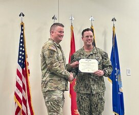Defense Language Institute Foreign Language Center Commandant Col. James Kievit presented Cryptologic Technician Interpretive 1st Class Austin Gentry, a Military Language Instructor at Information Warfare Training Command Monterey, with the Joint Service Achievement Medal during a ceremony at Cook Hall on July 21, 2023. Gentry was recognized for his exceptional achievements and selection as the DLIFLC’s Military Language Instructor of the Quarter for third quarter for fiscal year 2023.