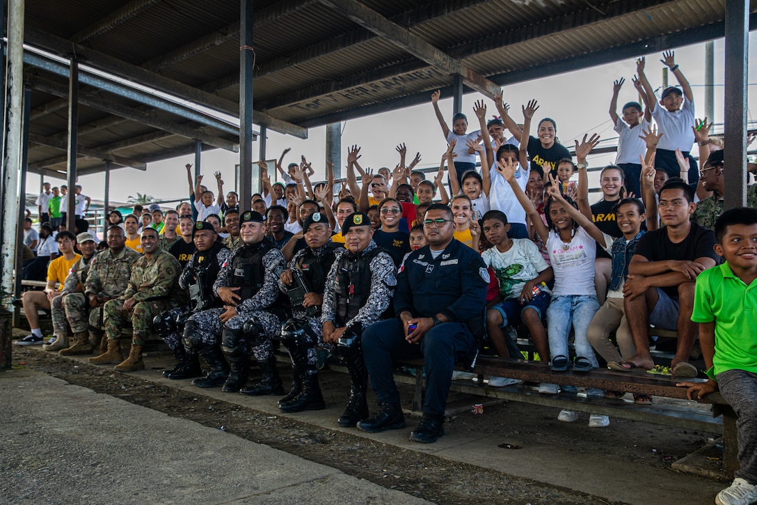 U.S. service members participate in a volleyball game with members of the local community in Almirante, Panama as part of the Continuing Promise 2023 mission.