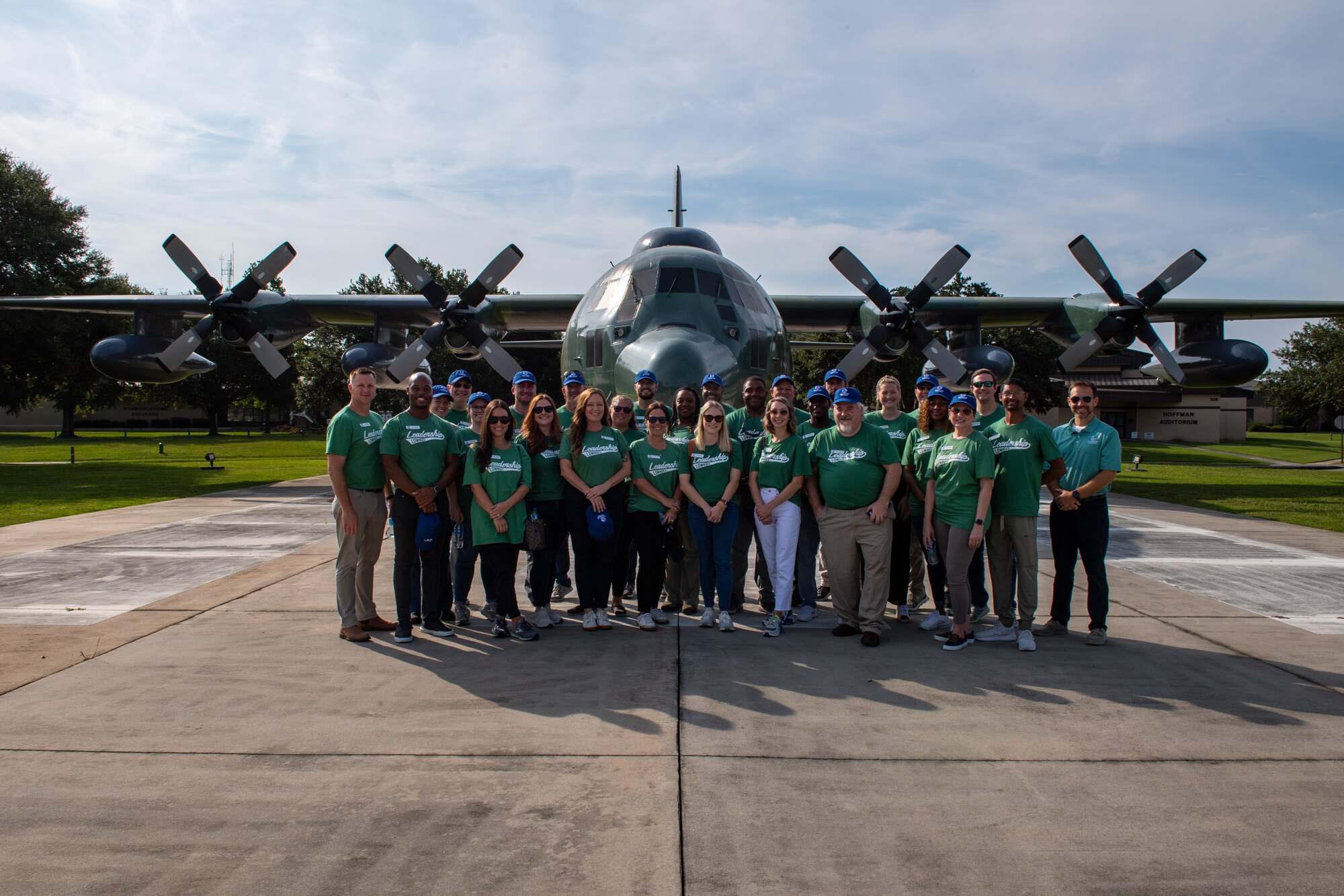 Leadership Lowndes class of 2023 smiles for a photo during a Defense Day tour at Moody Air Force Base, Georgia, Aug. 17, 2023. Leadership Lowndes has partnered with Moody Air Force Base for over 30 years, resulting in a close working relationship of support between Moody and the local community. (U.S. Air Force photo by Senior Airman Courtney Sebastianelli)