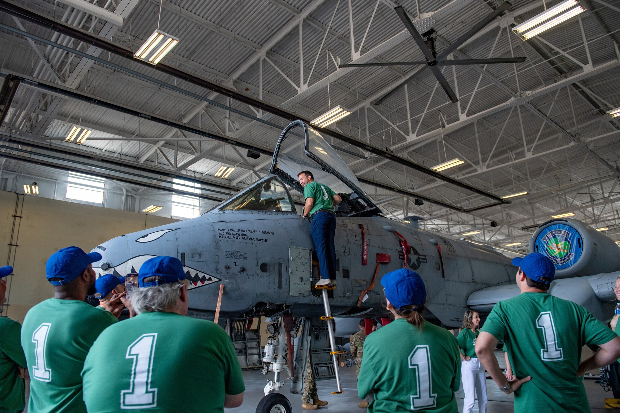 Leadership Lowndes participants interact with an A-10C Thunderbolt II during Defense Day at Moody Air Force Base, Georgia, Aug. 17, 2023. During the Defense Day tour Leadership Lowndes members received a behind the scenes look at the daily operations that occur at Moody. (U.S. Air Force photo by Senior Airman Courtney Sebastianelli)