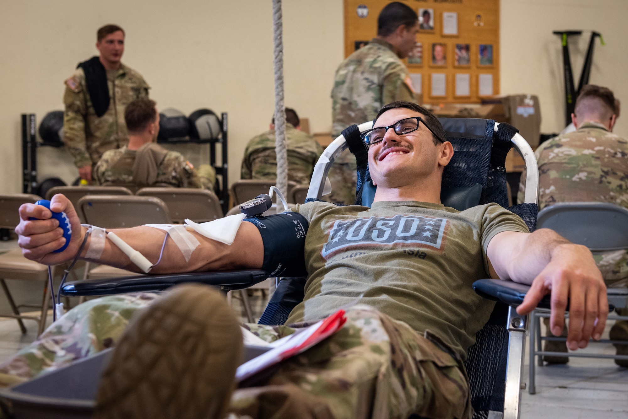 Army National Guard Sgt. Andrey Selivanov lies back in a chair as he donates blood in the Geronimo Gym at Joint Base Elmendorf-Richardson, Alaska.