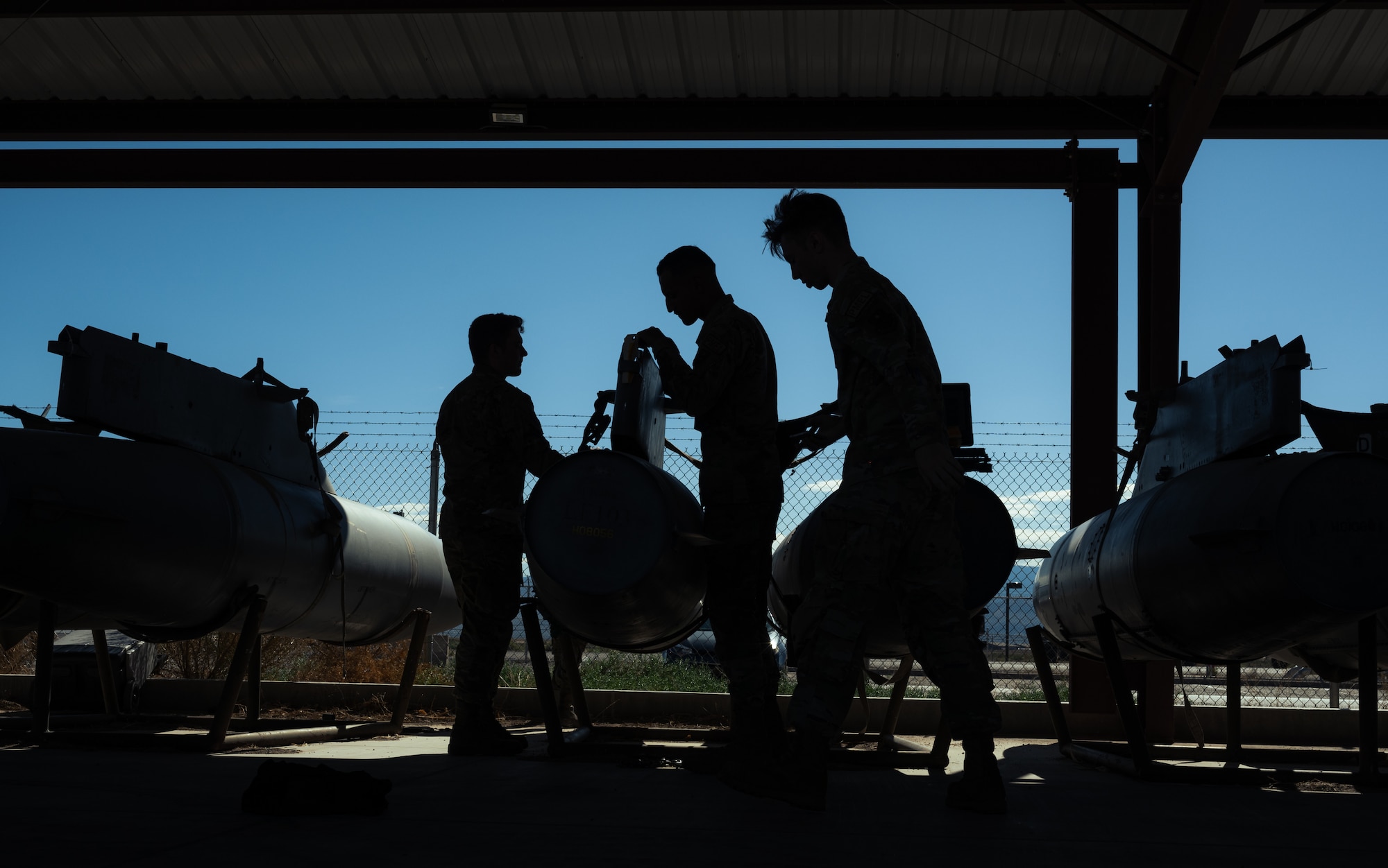 Airmen from the 49th Component Maintenance Squadron run a diagnostics test on an F-16 Viper external fuel tank at Holloman Air Force Base, New Mexico, Aug. 10, 2023. The inspections and maintenance that the 49th CMS fuel shop provides is crucial to keeping the largest F-16 formal training unit running. (U.S. Air Force photo by Senior Antonio Salfran)