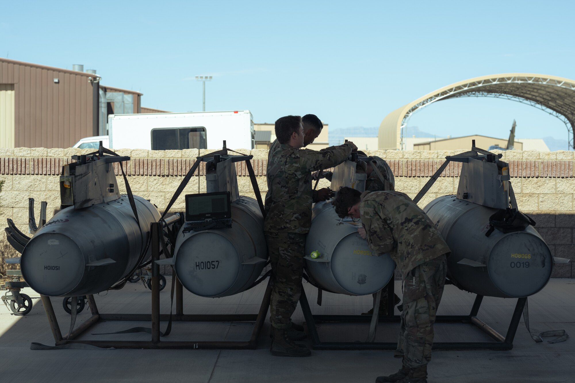 Airmen from the 49th Component Maintenance Squadron conduct a fuel tank inspection at Holloman Air Force Base, New Mexico, Aug. 10, 2023. The fuels section and the PMEL flight worked together to lead and develop multi-capable Airmen, boosting the 49th Wing’s ability to build combat ready aircrews. (U.S. Air Force photo by Senior Airman Antonio Salfran)
