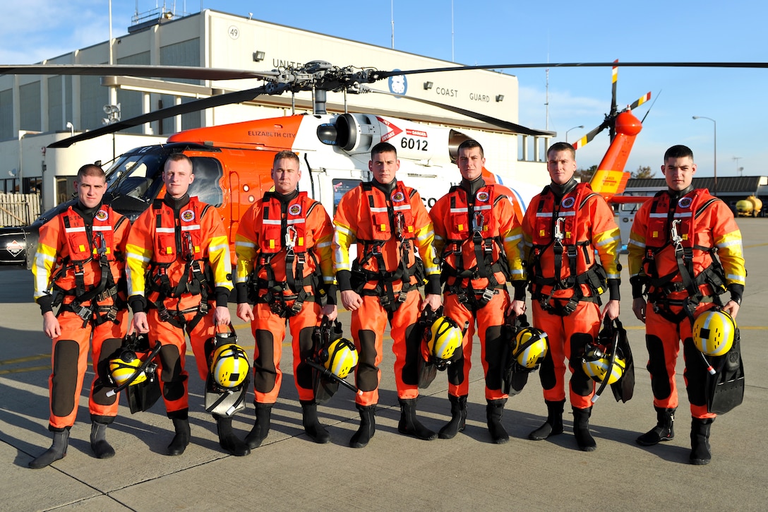 Group photograph of modern Coast Guard rescue swimmers whose program owes its founding to changes mandated after the tragic loss of the Marine Electric. (U.S. Coast Guard photo)