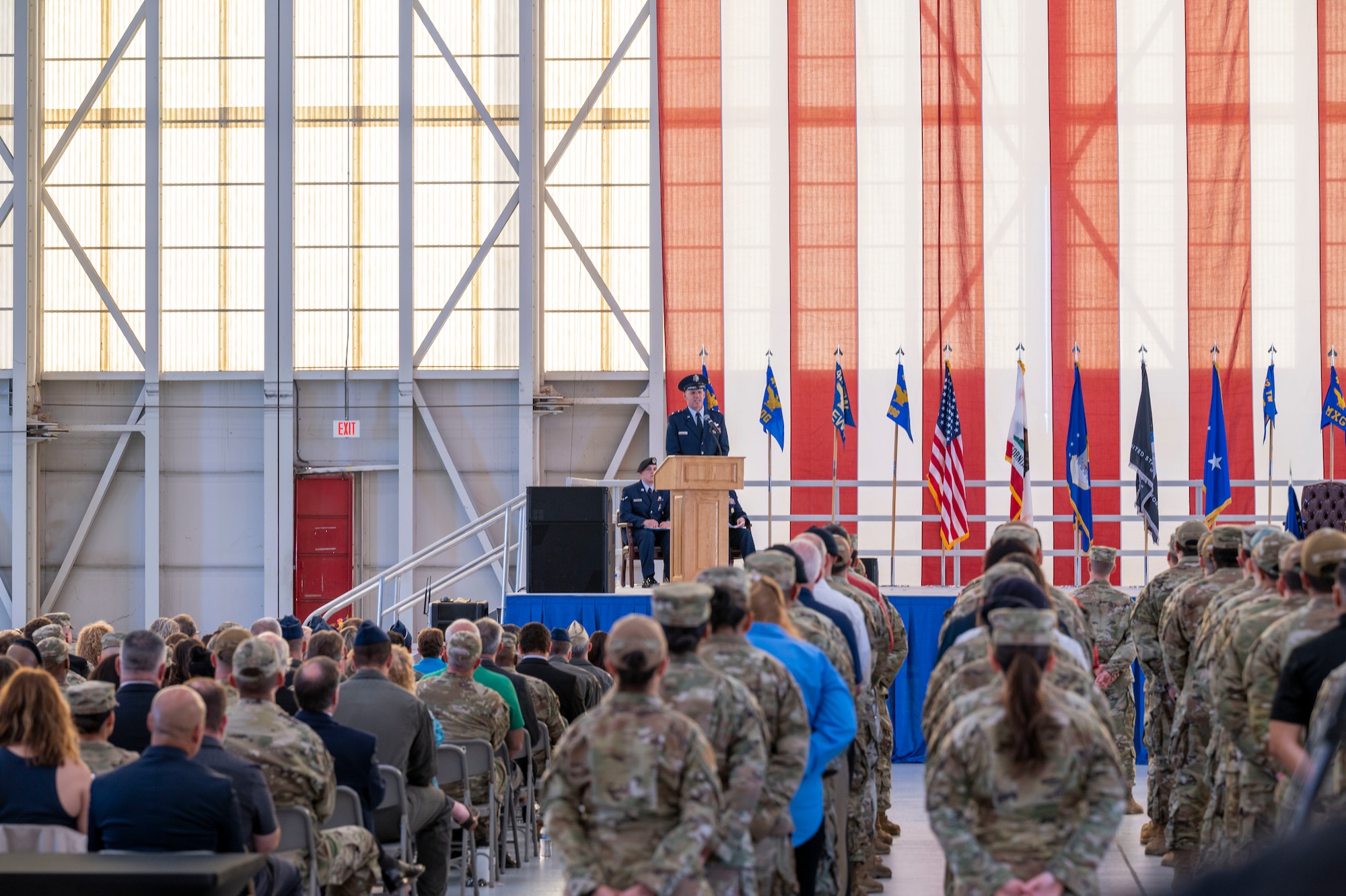 Maj. Gen. Evan Dertien, Air Force Test Center commander, gives remarks during the 412th Test Wing Change of Command Ceremony between outgoing commander, Brig. Gen. Matthew Higer and incoming commander, Col. Douglas Wickert, at Edwards Air Force Base, California, Aug.18.