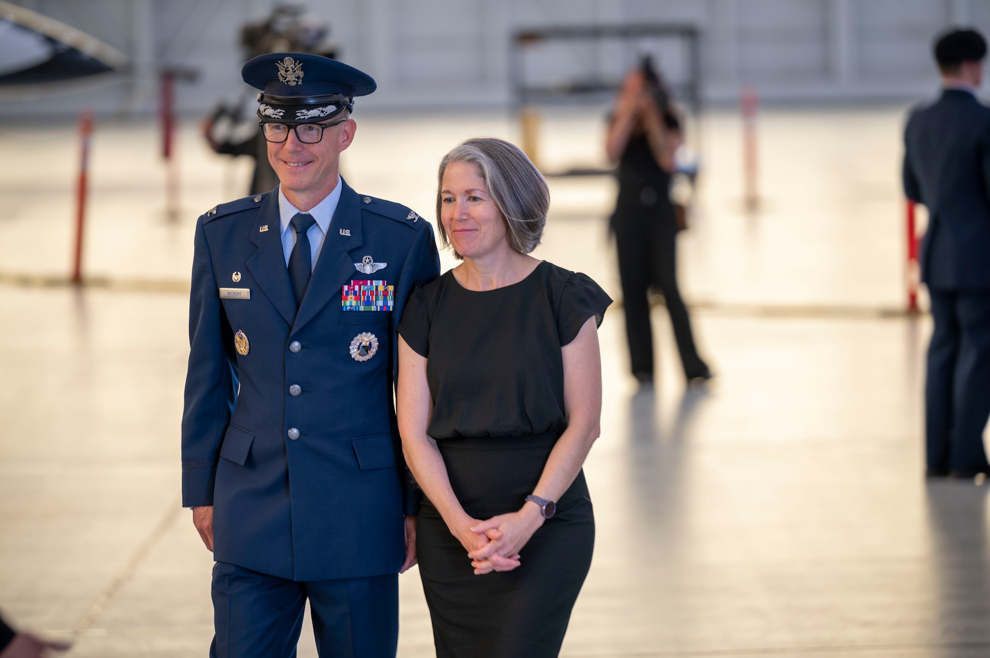 The 412th Test Wing’s new commander, Col. Douglas Wickert and his wife Jody Wickert, prepare to greet Team Edwards after the Wing’s Change of Command Ceremony at Edwards Air Force Base, California, Aug. 18.