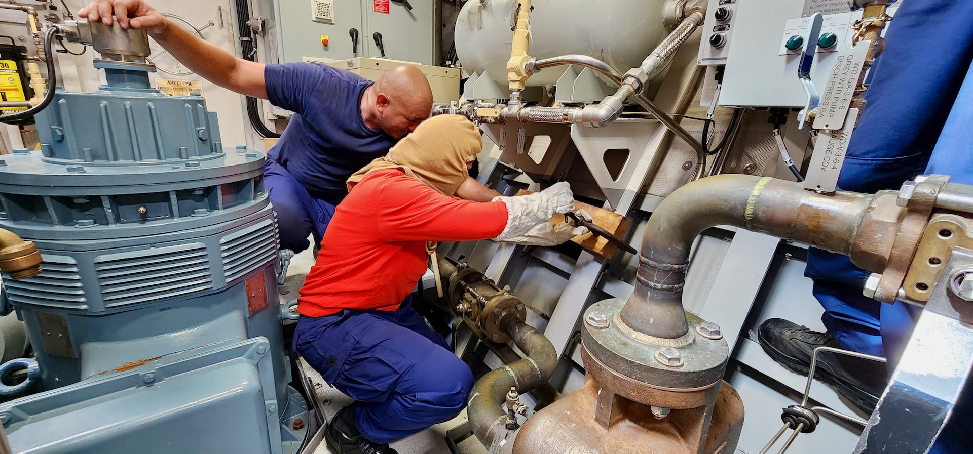 Petty Officer 1st Class Mendiola oversees a crewmember's response during a flooding drill aboard the USCGC Frederick Hatch (WPC 1143) while on patrol on July 19, 2023. Frederick Hatch's crew conducted a patrol in support of Operation Rematau and partners in the Federated States of Micronesia. (U.S. Coast Guard photo by Ensing Melissa Reilly)