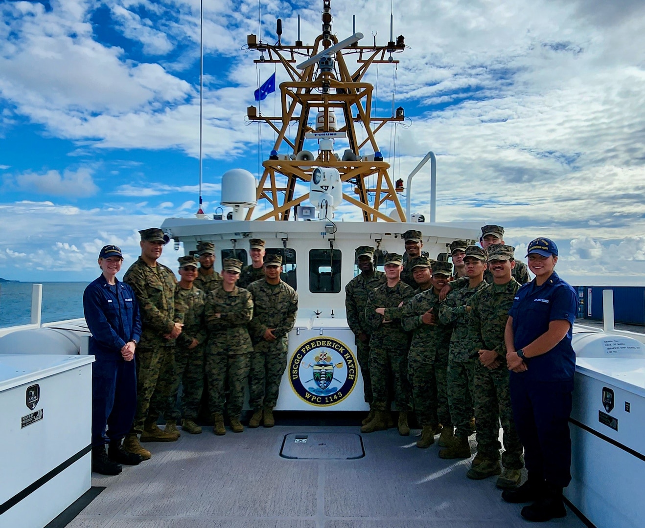 Lt. j.g. Sims and Ensign Salang welcome the Marine Corps Detachment in Chuuk for Operation Koa Moana aboard the USCGC Frederick Hatch (WPC 1143) for a tour while visiting Chuuk, Federated States of Micronesia, on July 28, 2023. The crew conducted a patrol in FSM in support of Operation Rematau. (U.S. Coast Guard photo)