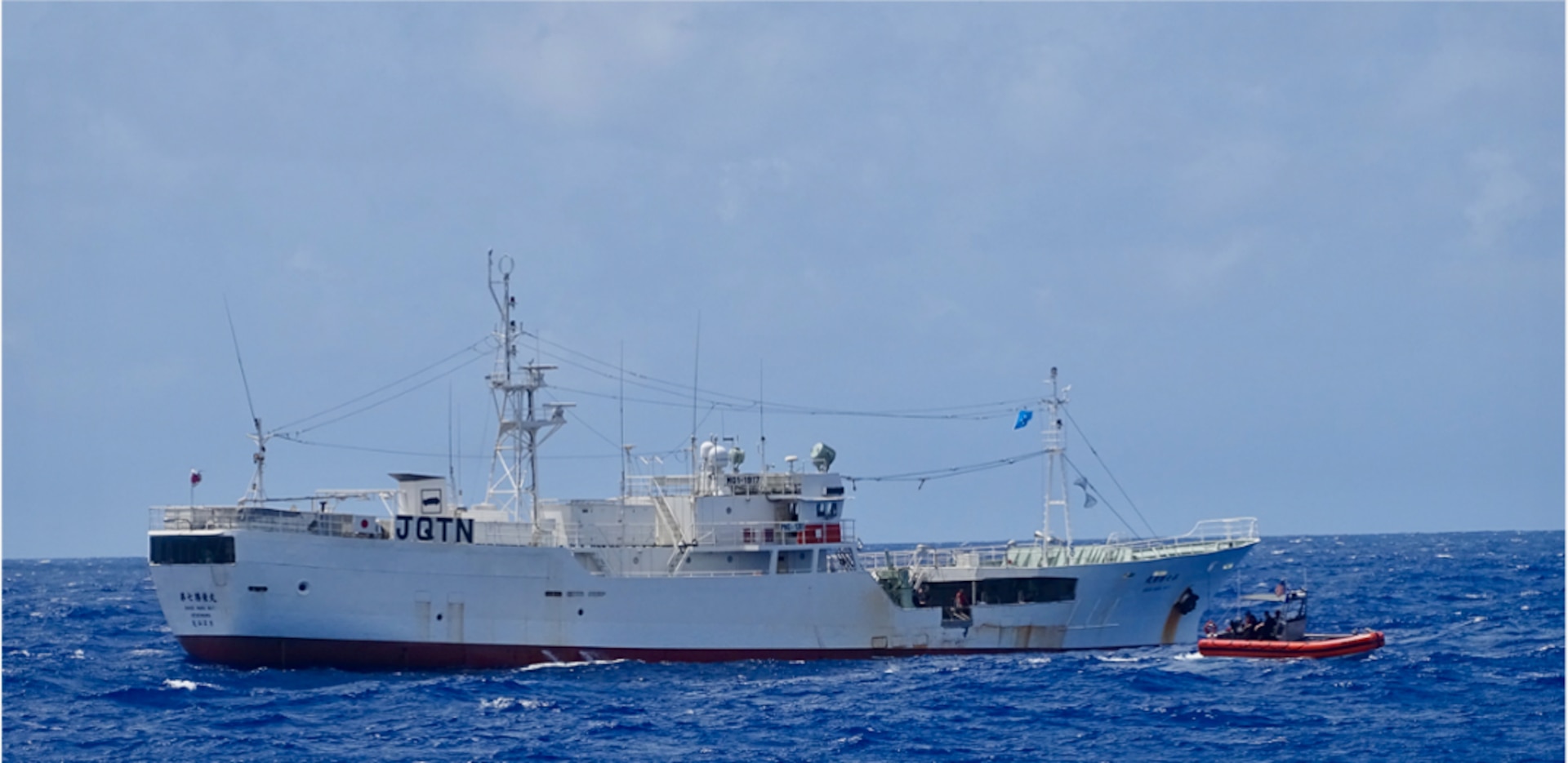 USCGC Frederick Hatch (WPC 1143) crew conducts fisheries boarding on the fishing vessel Shoei Maru No. 7 under the newly expanded bilateral agreement in late June 2023. THe cutter crew was on patrol in the Federated States of Micronesia exclusive economic zone for Operation Rematau. (U.S. Coast Guard photo)