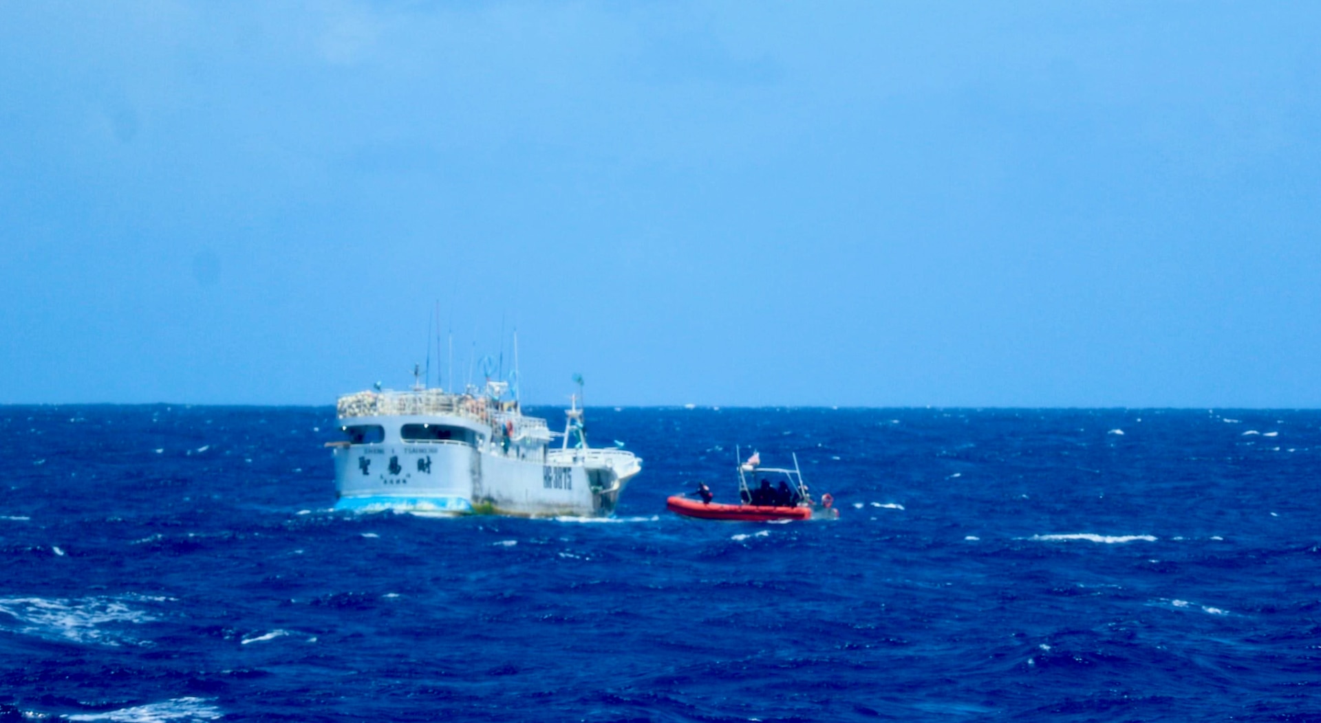 USCGC Myrtle Hazard (WPC 1139) crew conducts fisheries boardings under the Western and Central Pacific Fisheries Authority on the high seas in early July 2023. The team patrolled to the north and west of Guam and the Commonwealth of the Northern Mariana Islands in support of Operation Reamtau. (U.S. Coast Guard photo)