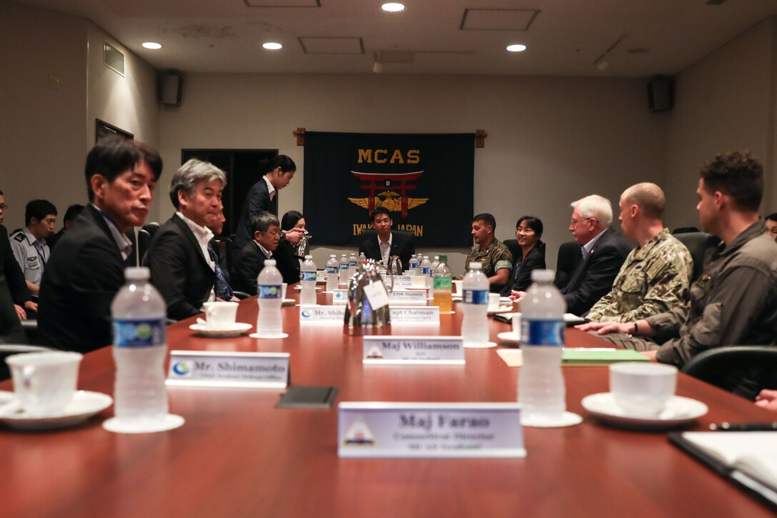 Ino Toshiro, the Japan State Minister of Defense, center, attends a meeting with Marine Corps Air Station Iwakuni leadership at MCAS Iwakuni, Japan, July 21, 2023. The Japan State Minister of Defense visited MCAS Iwakuni to better his understanding of the installation’s operational capabilities and to attend an off-base meeting with Japanese assembly members. (U.S. Marine Corps photo by Cpl. Darien Wright)