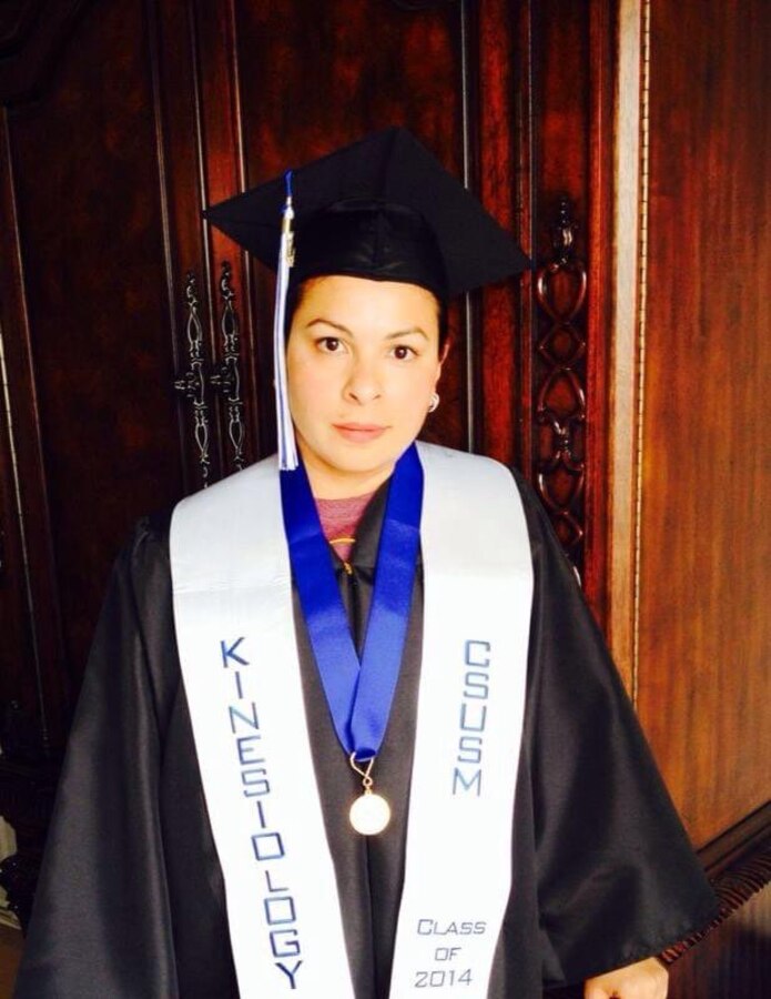 Corina Gonzalez poses for a photo on the day of her graduation from college. Gonzalez is a Marine Corps veteran and loving mother who volunteers at numerous organizations throughout MCAS Iwakuni, and has proven to be a diligent and dedicated member of the community. (Courtesy photo by Corina Gonzalez)