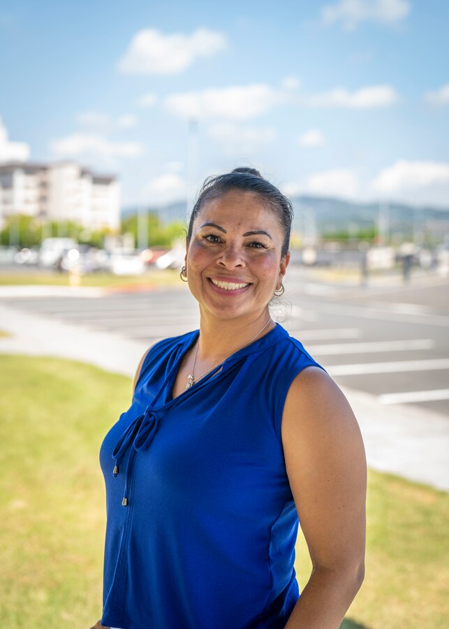 A portrait photo of Corina Gonzalez, at Marine Corps Air Station Iwakuni, Japan, Aug. 1, 2023. Gonzalez is a Marine Corps veteran and loving mother who volunteers at numerous organizations throughout MCAS Iwakuni, and has proven to be a diligent and dedicated member of the community. (U.S. Marine Corps photo by Sgt. Mitchell Austin)