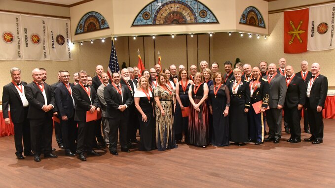 Members of the U.S. Army Field Artillery Association and U.S. Army Air Defense Artillery Association gather to induct nearly 70 of its newest members into the Order of Saint Barbara military society at Redstone Arsenal's Summit, July 29, 2023. (U.S. Army photo by Jason B. Cutshaw)