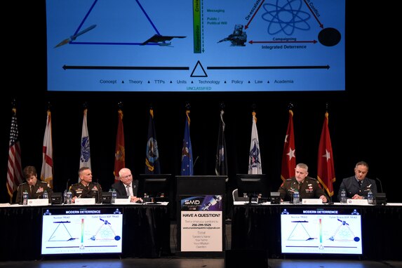 Army leaders talk about space-cyber-special operations triad during panel on Aug. 8 at the 26th annual Space and Missile Defense Symposium. Participants were Lt. Gen. Daniel L. Karbler, commanding general of U.S. Army Space and Missile Defense Command; Lt. Gen. Maria Barrett, commanding general of U.S. Army Cyber Command; Lt. Gen. Jon Braga, commanding general of U.S. Army Special Operations Command; and United Kingdom Royal Air Force Air Commodore Adam Bone, U.K. Space Command director of operations, plans and training. (U.S. Army photo by Carrie David Campbell)