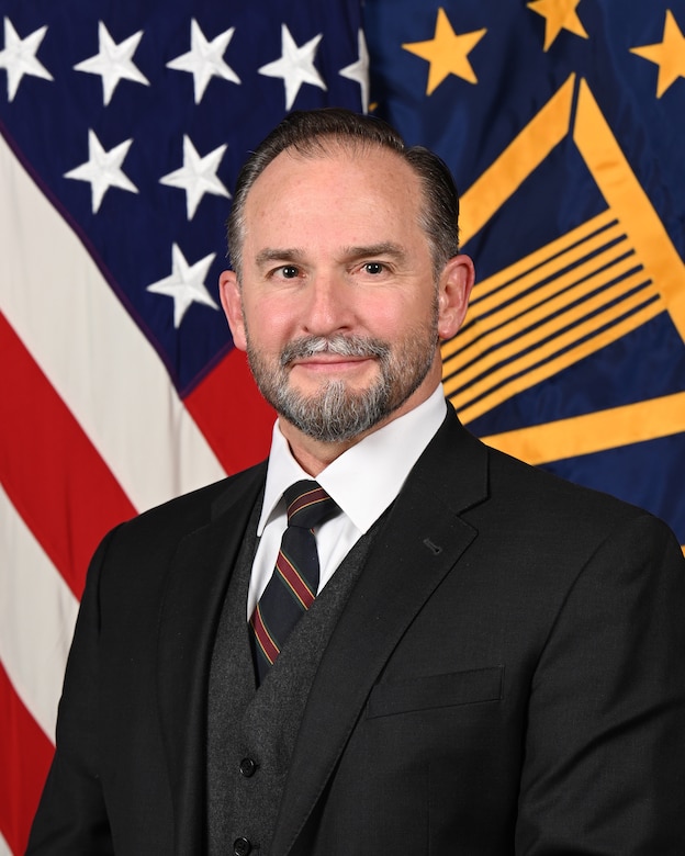 Mr. Chris Bargery > U.S. Department of Defense > Biography