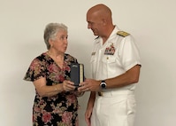 Virginia Beach, Va. The Navy posthumously recognized Lt. j.g. William Collins, a Vietnam War veteran and former officer-in-charge of a swift boat, during a ceremony today onboard Joint Expeditionary Base Little Creek-Fort Story. Collins’ wife Estella and his family accepted the Bronze Star Medal with combat V on his behalf from Rear. Adm. Brad Andros, commander, Navy Expeditionary Combat Command (NECC).U.S. Navy photo by Spencer R. Layne/Released