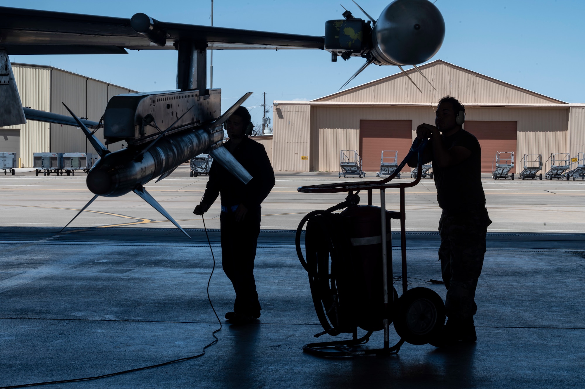Airmen from the 311th Aircraft Maintenance Unit perform an engine check at Holloman Air Force Base, New Mexico, Aug. 15, 2023.
