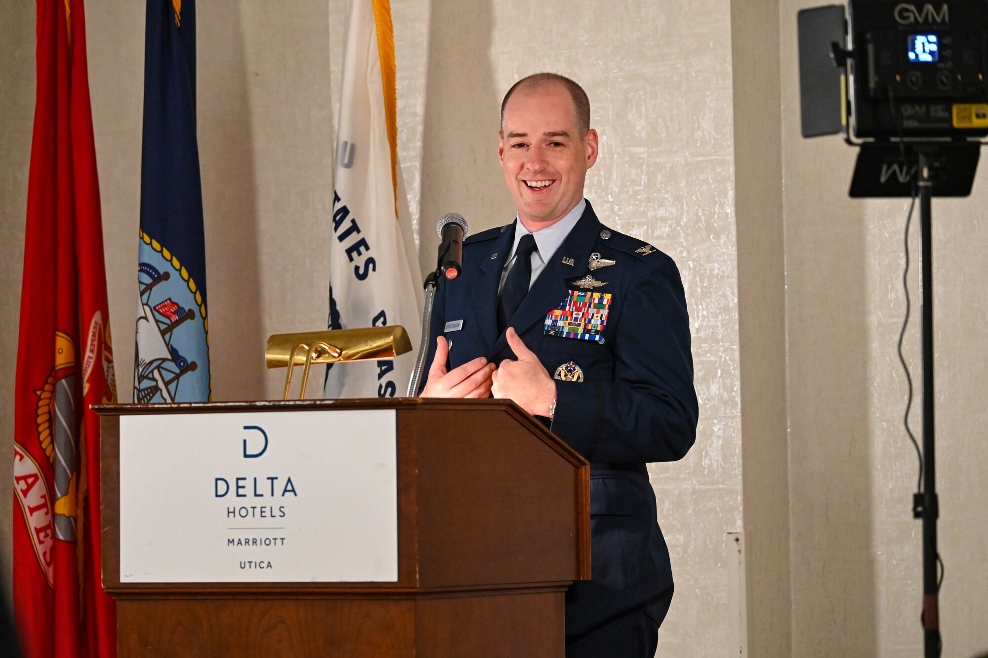 U.S. Air Force Col. John Christianson, 350th Spectrum Warfare Wing deputy commander, speaks at the Virtual Institutes for Cyber and Electromagnetic Spectrum Research and Employ (VICEROY) MAVEN graduation ceremony, Utica, New York, Aug. 4, 2023. The wing hosted seven interns this past summer that worked on mission sets such as integrating AI to speed up aircraft reprogramming, building threat representative test models for bombers and F-35s, improving multi-level data analysis processes using new algorithms and improving missile assessment in large force exercises. (U.S. Air Force photo by Capt. Benjamin Aronson)