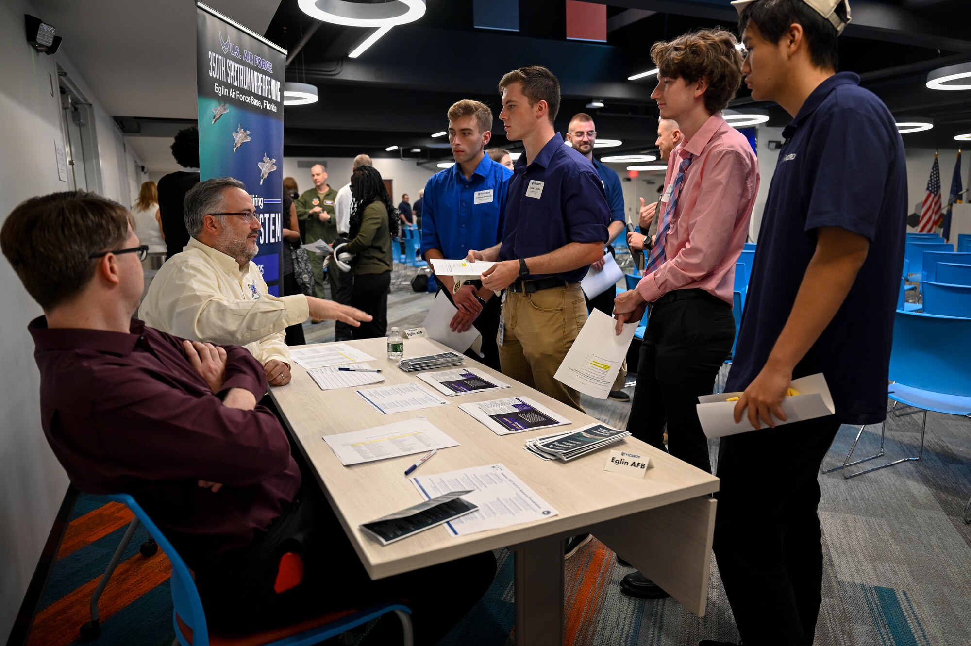 Virtual Institutes for Cyber and Electromagnetic Spectrum Research and Employ (VICEROY) MAVEN interns talk with members of the 350th Spectrum Warfare Wing about the mission and potential intern or career opportunities during the VICEROY MAVEN graduation at The Griffiss Institute, Rome, New York, Aug. 4, 2023. The 350th SWW hosted seven VICEROY interns this past summer across four squadrons as part of their second year in the VICEROY Program. (U.S. Air Force photo by Capt. Benjamin Aronson)