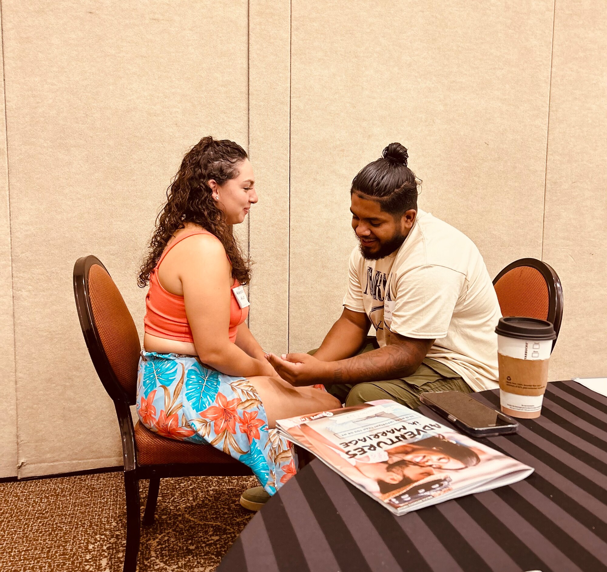 Service members and their spouses engage in relationship building exercises during the MacDill Air Force marriage retreat in Maitland, Florida, August 4, 2023.