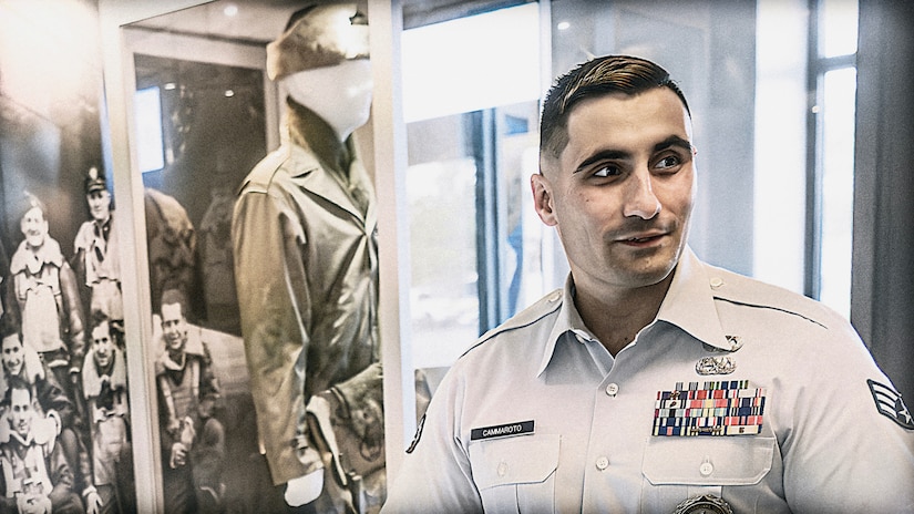 A photo of an airman discussing Air Force history