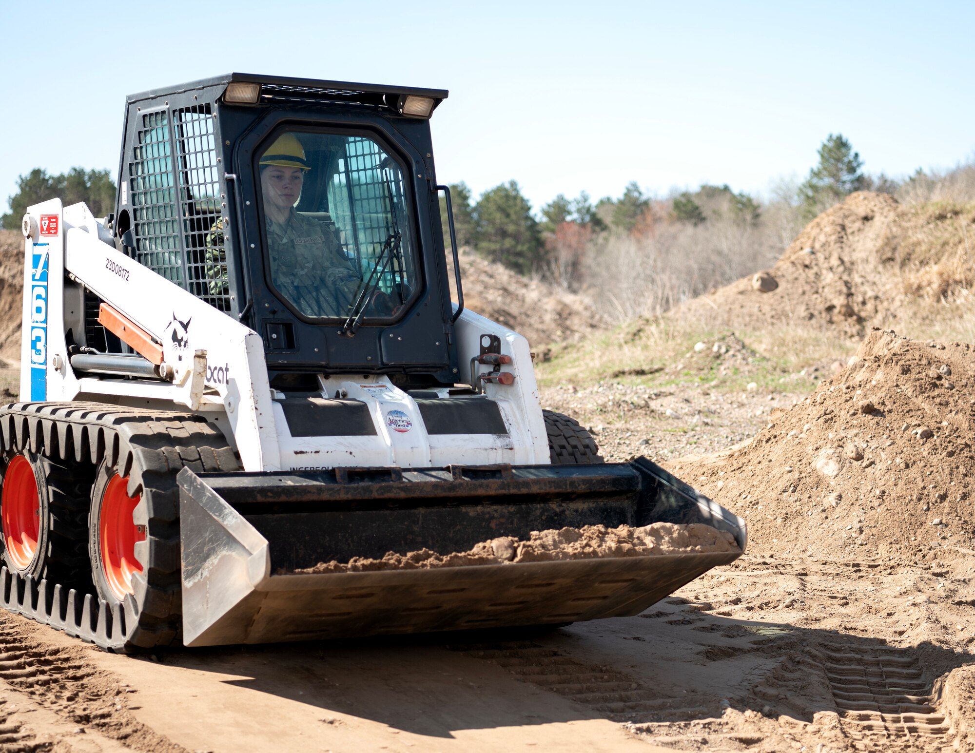 U.S. Air Force Airmen from the 210th Engineering Installation Squadron Squadron trained on Engineering and Installation of heavy equipment, including a cable reel truck, trencher, mid pro, and skid steer at Camp Ripley, Little Falls, Minn., May 5, 2023.