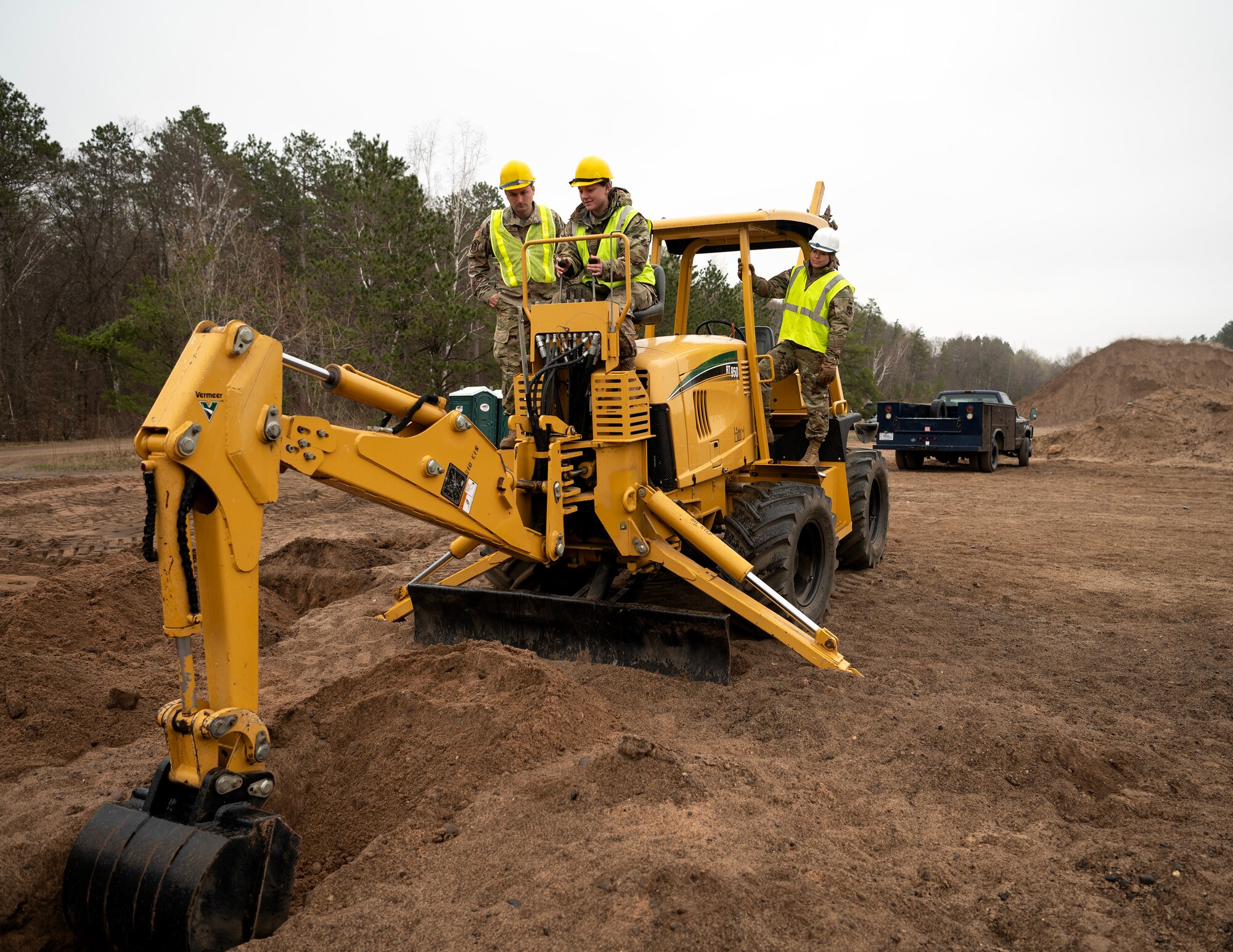 U.S. Air Force Airmen from the 210th Engineering Installation Squadron trained on Engineering and Installation of heavy equipment, including a cable reel truck, trencher, mid pro, and skid steer at Camp Ripley, Little Falls, Minn., May 5, 2023.