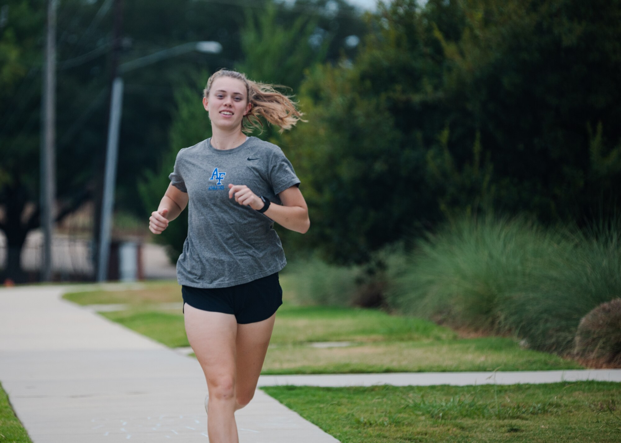 1st Lt. Tara DeGeorge, 96th Bomb Squadron B-52H Stratofortress pilot, performs sprints at a fitness center in Shreveport, Louisiana.