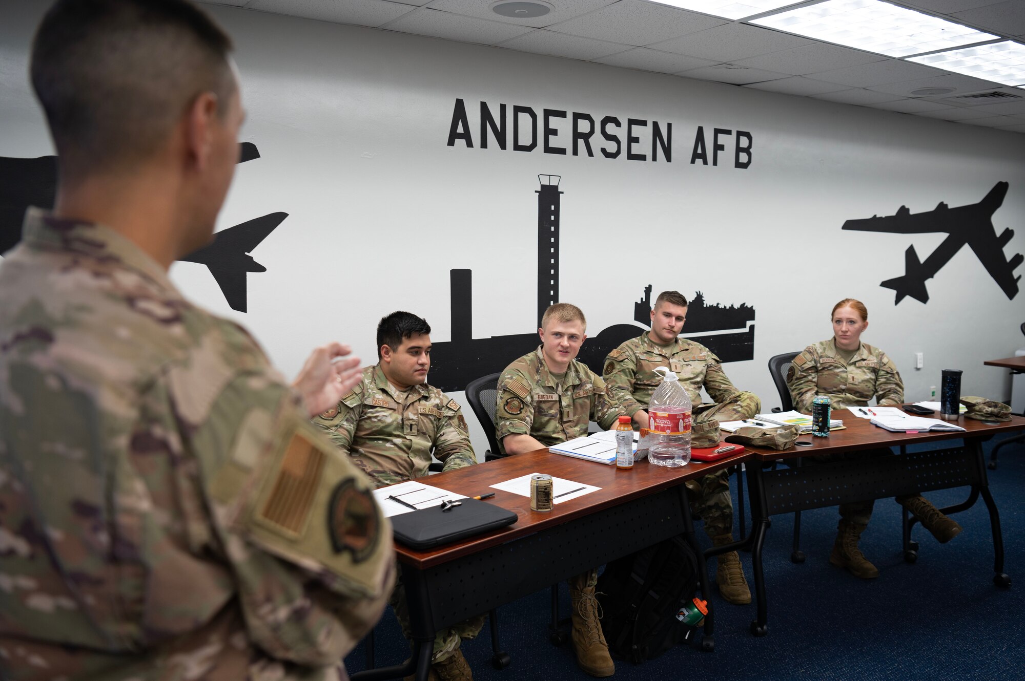 Lt. Col. Marc Johansen, the commander of the 36th Civil Engineer Squadron, teaches a lesson to new company grade officers during a flight commander course at Andersen Air Force Base, Guam, Aug. 17, 2023. The goal of the course was to build, refine, and develop company grade officer’s leadership and ability to support the four major roles of command: execute the mission, manage resources, improve the unit, and lead people. (U.S. Air Force photo by Staff Sgt. Aubree Owens)