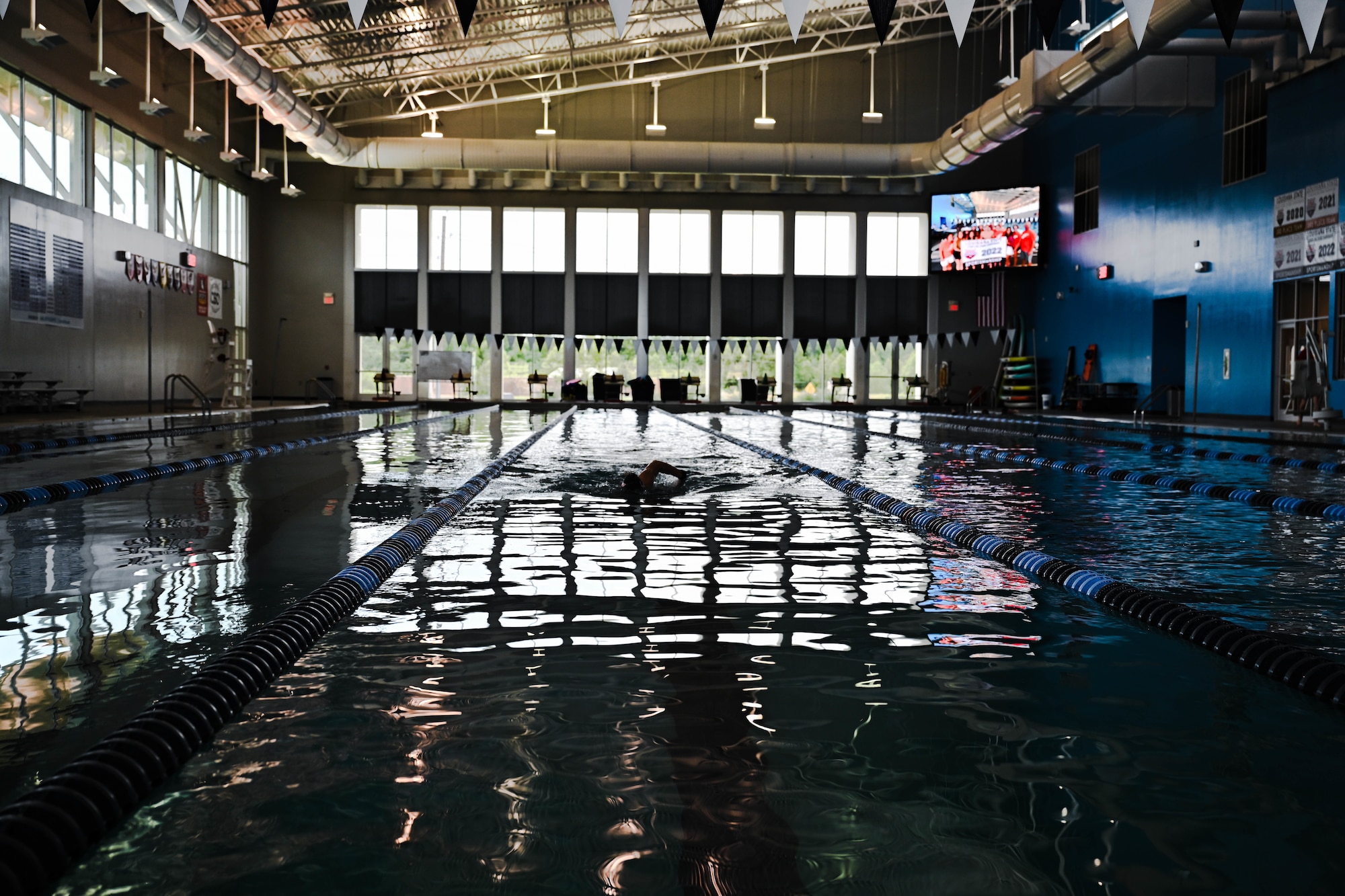 1st Lt. Tara DeGeorge, 96th Bomb Squadron B-52H Stratofortress pilot, swims laps at a fitness center in Shreveport, Louisiana.