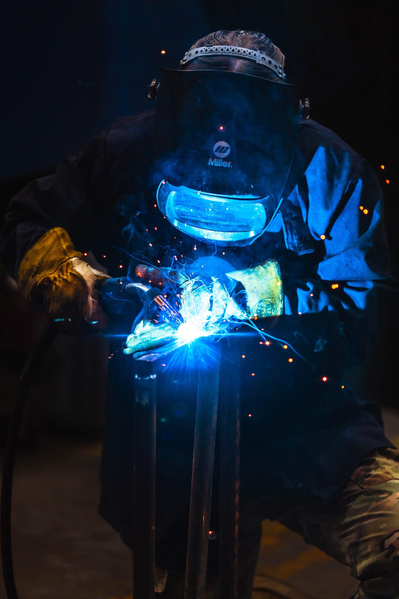 U.S. Air Force Airman 1st Class Kamryn Giddings, 56th Equipment Maintenance Squadron metals technology apprentice, performs metal inert gas welding.