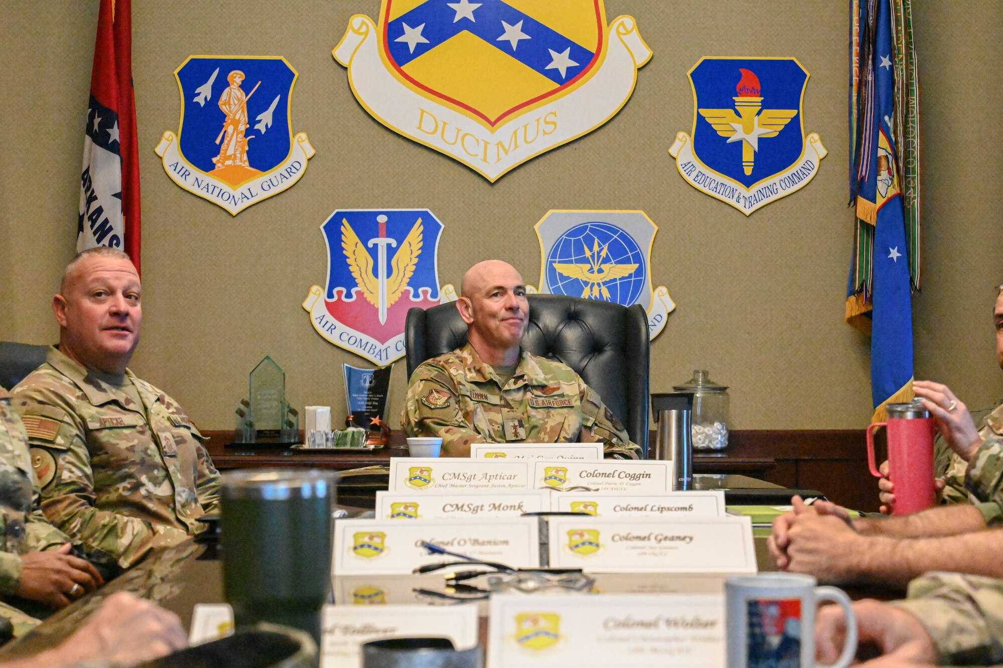 man in uniform get briefed by leaders