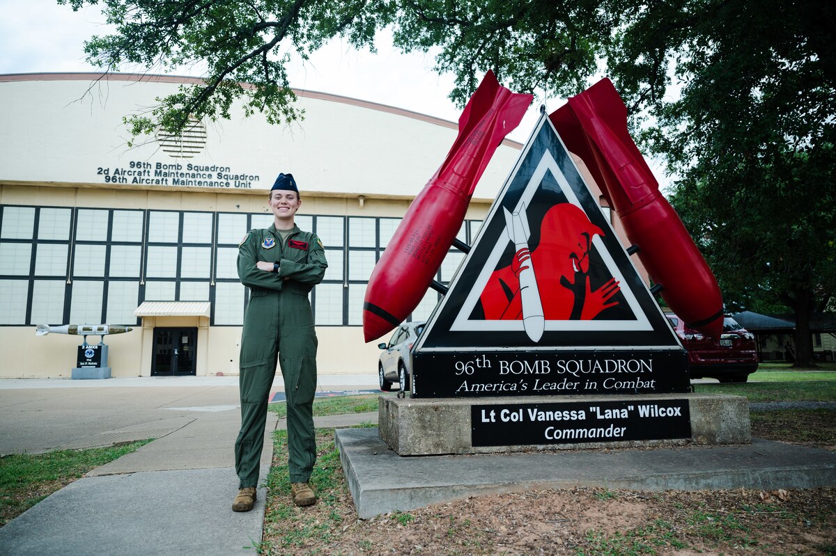 1st Lt. Tara DeGeorge, 96th Bomb Squadron B-52H Stratofortress pilot, poses for a picture in front of the 96th BS headquarters at Barksdale Air Force Base.