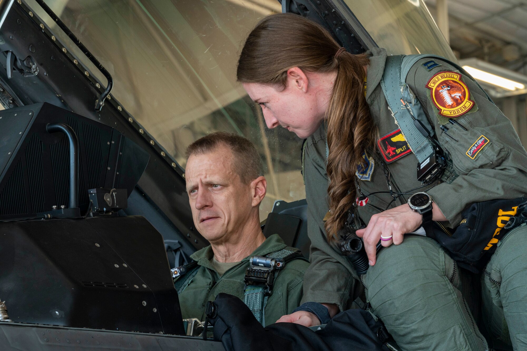 U.S. Air Force Capt. Ariel Demarzo, 8th Fighter Squadron flight commander, right, conducts a pre-flight gear check with U.S. Air Force Chief Master Sgt. Jeffrey Martin, 49th Wing command chief, at Holloman Air Force Base, New Mexico, Aug. 15, 2023.