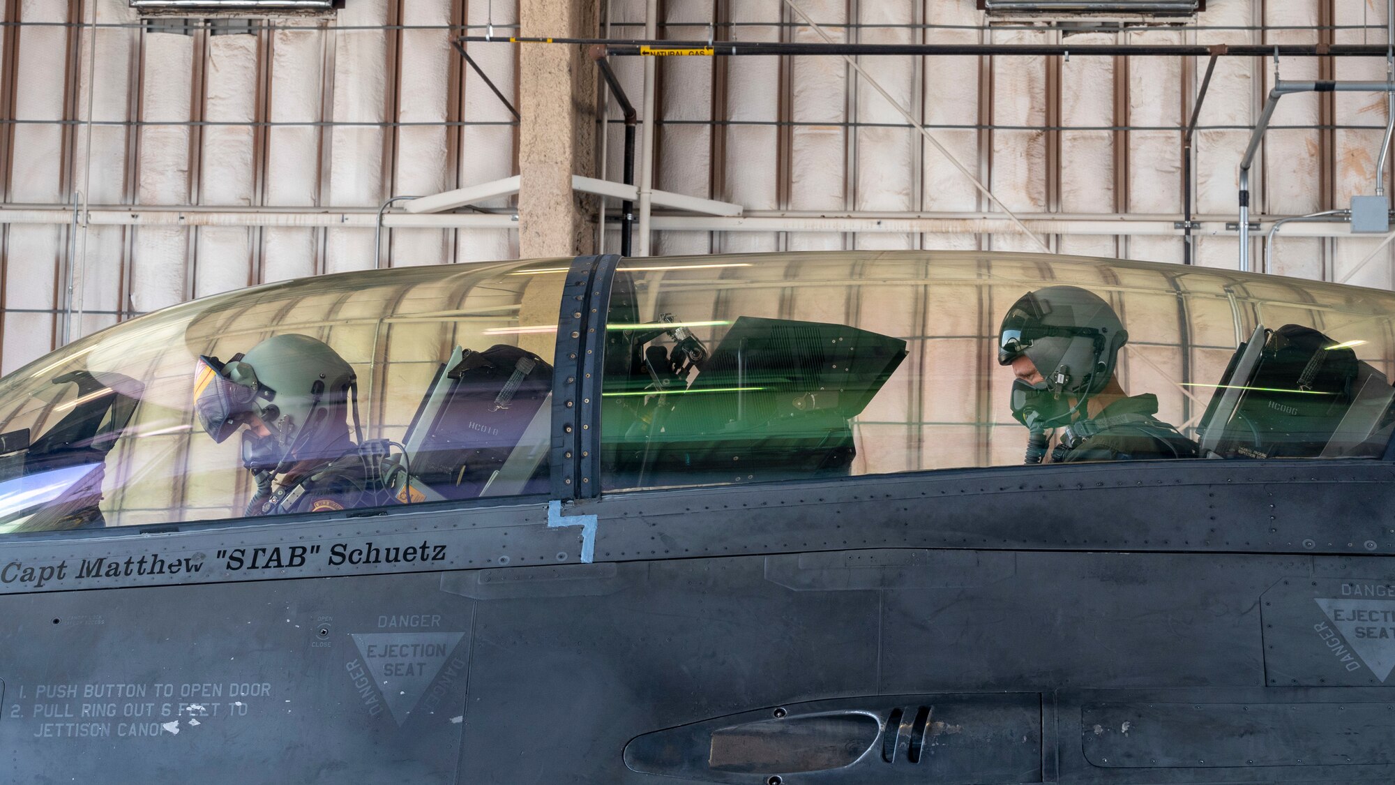 U.S. Air Force Chief Master Sgt. Jeffrey Martin, 49th Wing command chief, right, prepares to take off for a familiarization flight in an F-16 Viper with U.S. Air Force Capt. Ariel Demarzo, 8th Fighter Squadron flight commander at Holloman Air Force Base, New Mexico, Aug. 15, 2023.