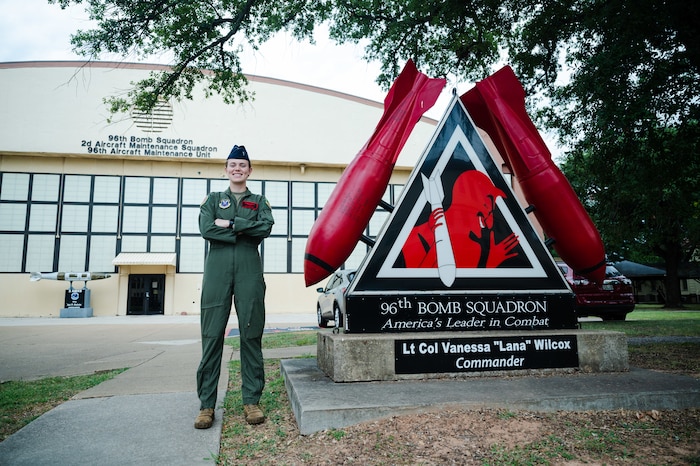 1st Lt. Tara DeGeorge, 96th Bomb Squadron B-52H Stratofortress pilot, poses for a picture in front of the 96th BS headquarters at Barksdale Air Force Base.