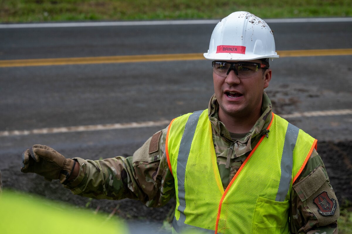 Tech Sgt. Andrew Brinza ,a 934th Airlift Wing Civil Engineering Squadron structures craftsman, directs his crew during the upgrade of Camp Mad Bull’s electrical system at Joint Base Elmendorf-Richardson, Alaska, on August 9, 2023. The 934 AW CES was at the site for over two months in a series of 3 different rotations to effectively complete the mission. (Air Force photo by Senior Airman Matthew Reisdorf)
