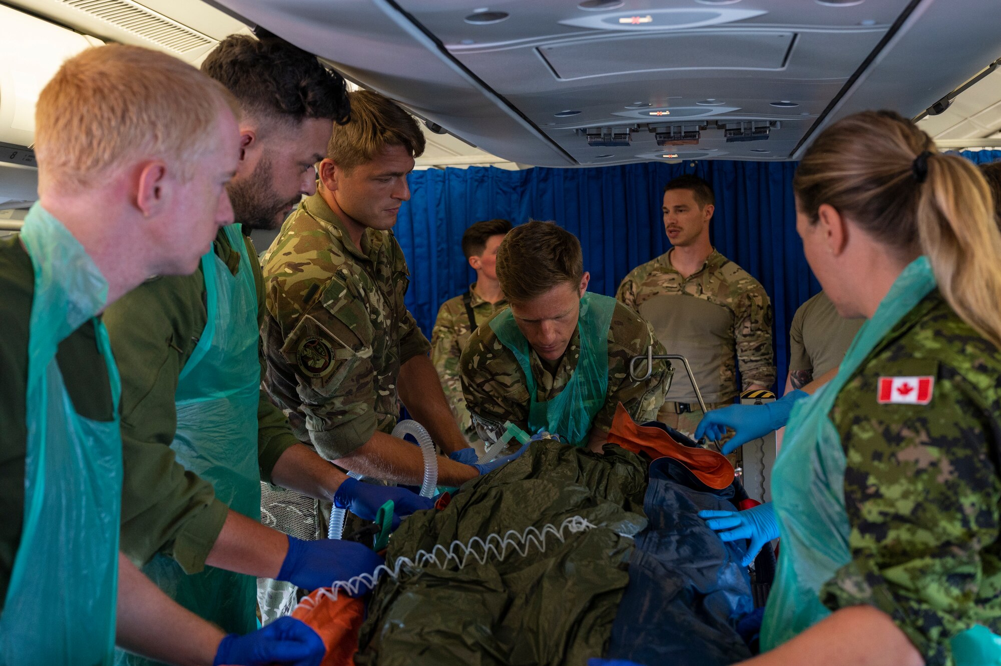 Royal Canadian Air Force, Royal New Zealand Air Force, Royal Air Force and U.S. Air Force aeromedical evacuation members conduct a training mission on a RAF A330 Voyager above the Pacific Ocean, July 17, 2023. MG23 is a multilateral exercise involving joint foreign partners to showcase coalition ability in the INDOPACOM area of responsibility. (U.S. Air Force photo by Tech. Sgt. Joseph Pick)