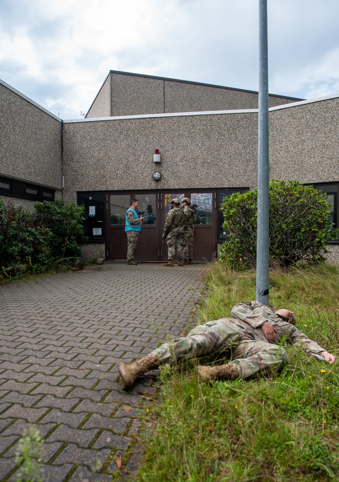 Airman simulates injury during active shooter exercise.