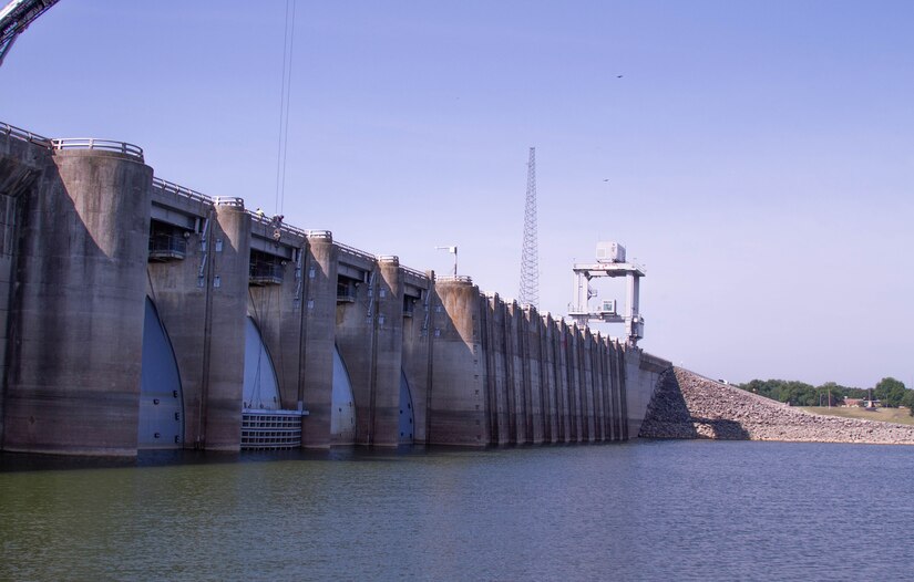 Dam at Truman Lake shown with stoplog being lowered by crane on right hand end. Taken on June 21, 2023.