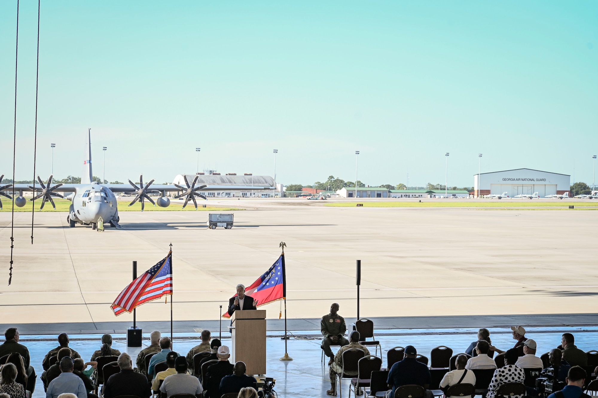Retired U.S. Air Force Brig. Gen. Stephen Westgate, a former 165th Airlift Wing commander, gives the keynote speech during the send-off ceremony held in honor of the final C-130 Hercules aircraft leaving Savannah Air National Guard Base in Savannah, Georgia, August 18, 2023.