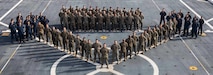 U.S. Marines from Combat Logistics Battalion 8, Combat Logistics Regiment 27, 2nd Marine Logistics Group, pose for a group photo aboard the San Antonio-class amphibious transportation dock USS New York (LPD 21) July 3, 2023. Marines assigned to CLB-8, based out of Camp Lejeune, North Carolina, embarked aboard USS New York during Exercise UNITAS LXIV. UNTAS is the world’s longest-running annual multinational maritime exercise that focuses on enhancing interoperability among multiple nations and joint forces during littoral and amphibious operations in order to build on existing regional partnerships and create new enduring relationships that promote peace, stability, and prosperity in the U.S. Southern Command’s area of responsibility. (U.S. Marine Corps photo by Lance Cpl. Christian Salazar) or (U.S. Marine Corps photo by Lance Cpl. Mary Kohlmann)