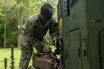U.S. Marine Corps Cpl. Cesar Ramirezfrias, generator technician with Combat Logistics Battalion 8, Combat Logistics Regiment 2, 2nd Marine Logistics Group, native of Carrollton, Ga., resupplies participating nations’ generators with fuel during Exercise UNITAS LXIV on Base de entrenamiento de infanteria de marina (Colombian Marine Corps training base) Covenas, Colombia, July 12,2023. UNITAS, which is taking place in Colombia this year, is the world’s longest-running annual multinational maritime exercise that focuses on enhancing interoperability among multiple nations and joint forces during littoral and amphibious operations in order to build on existing regional partnerships and create new enduring relationships that promote peace, stability, and prosperity in the U.S. Southern Command’s area of responsibility. (U.S. Marine Corps photo by Lance Cpl. Christian Salazar)